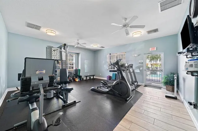 a view of a room with wooden walls