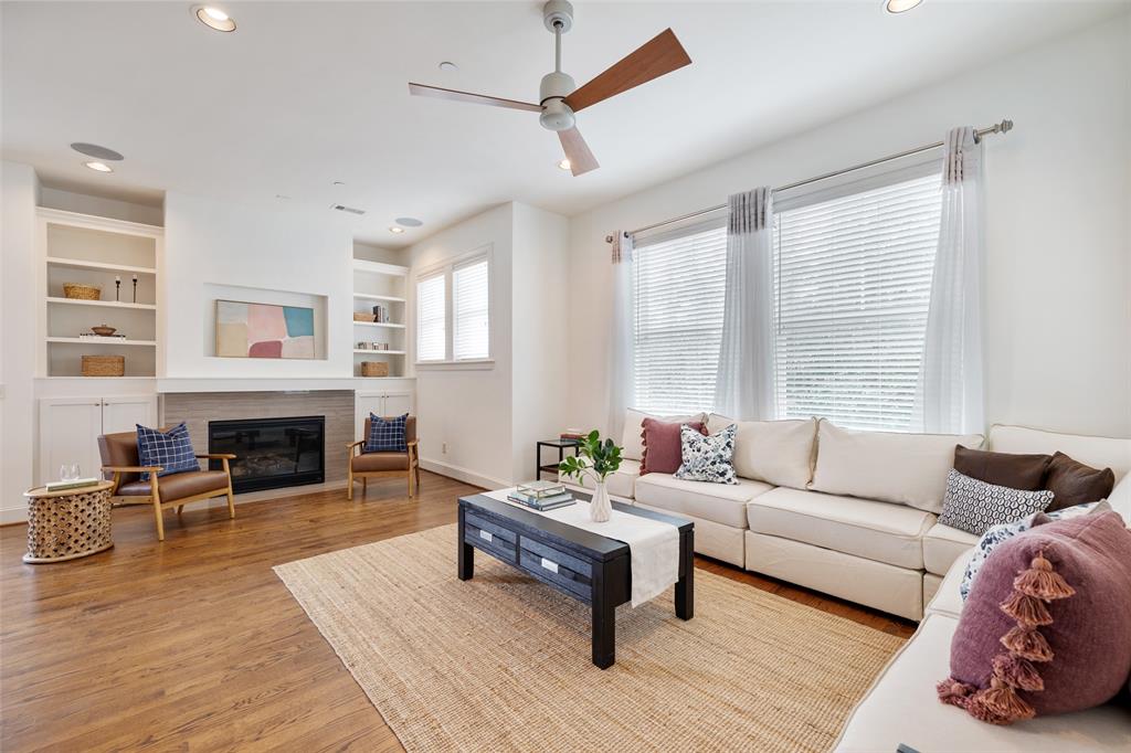 1919 Colquitt Street, Unit D Houston, TX 77098 - Photo 1 of 38 a living room with furniture and a fireplace