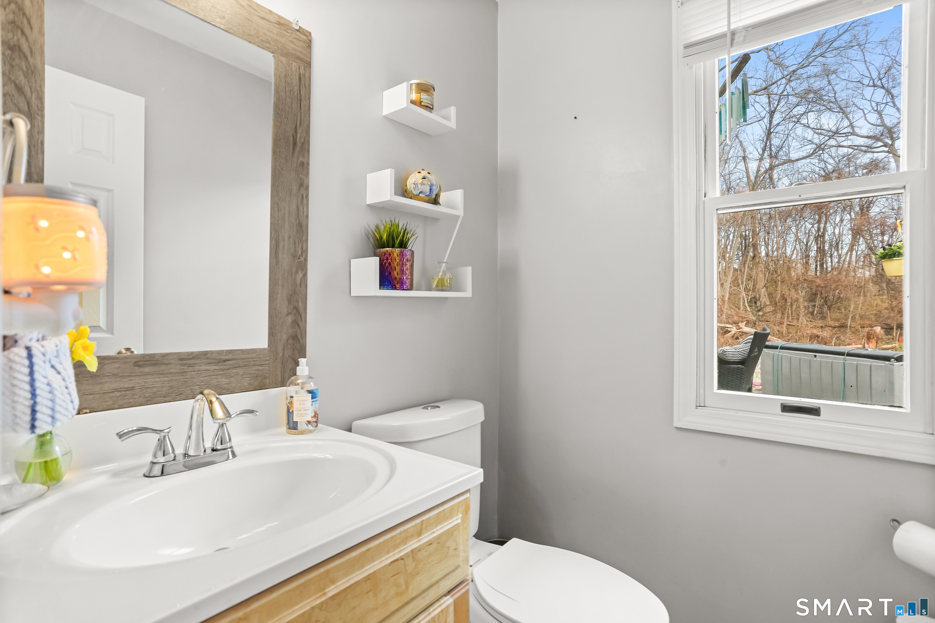 40 Sullivan Place Bridgeport, CT 06610 - Photo 12 of 21 a bathroom with a sink and a toilet