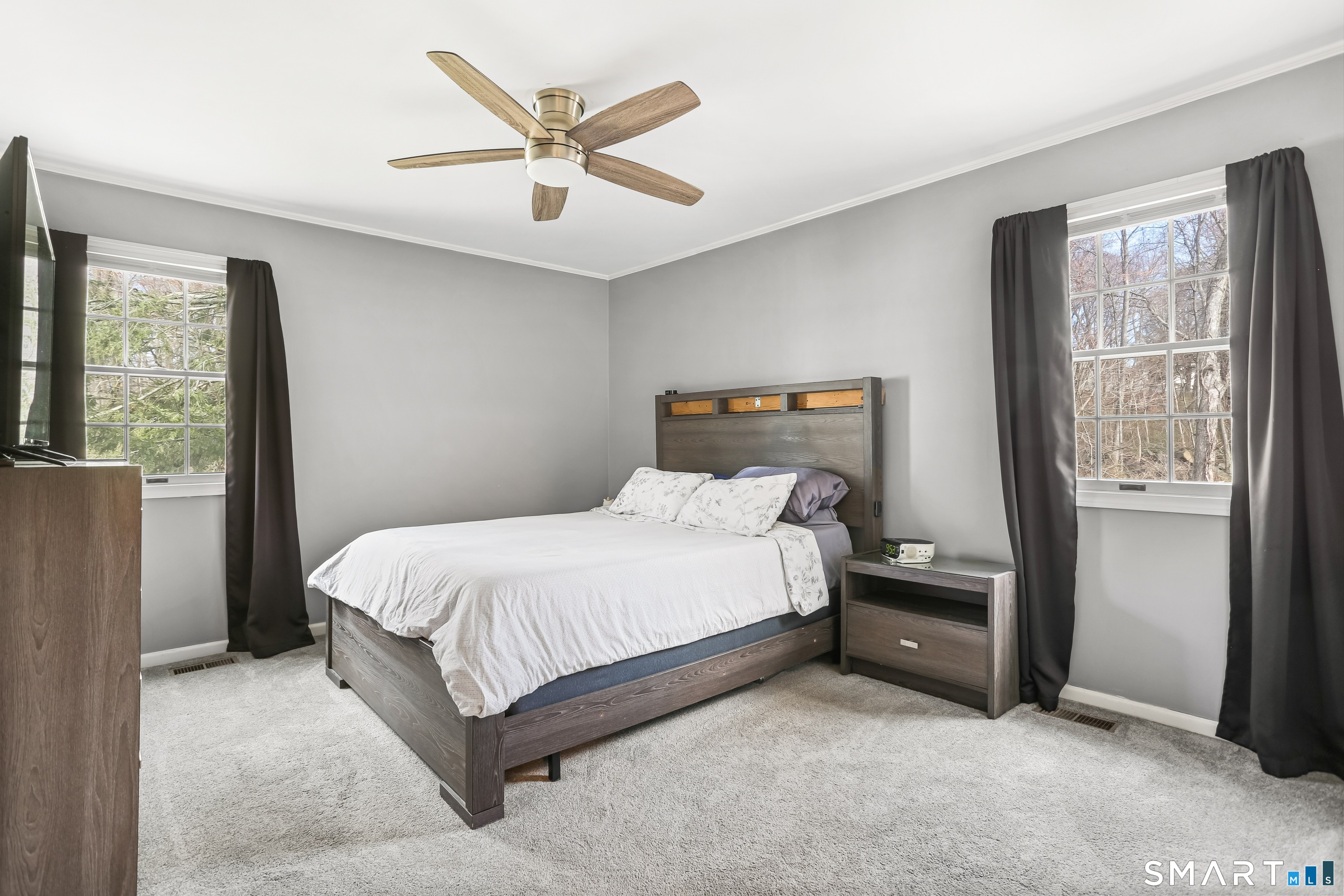 40 Sullivan Place Bridgeport, CT 06610 - Photo 15 of 21 a bed sitting in a room next to a window