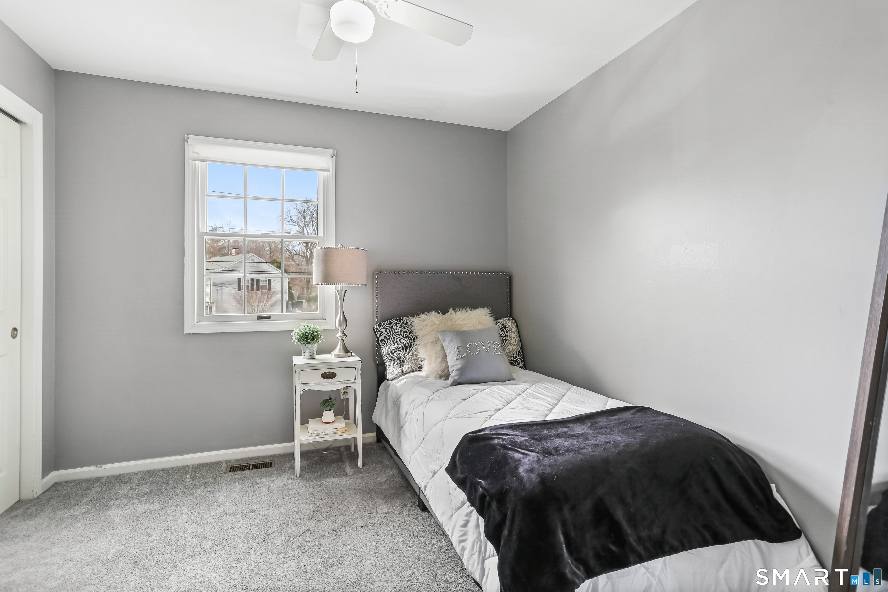 40 Sullivan Place Bridgeport, CT 06610 - Photo 17 of 21 a bedroom with a bed and a window