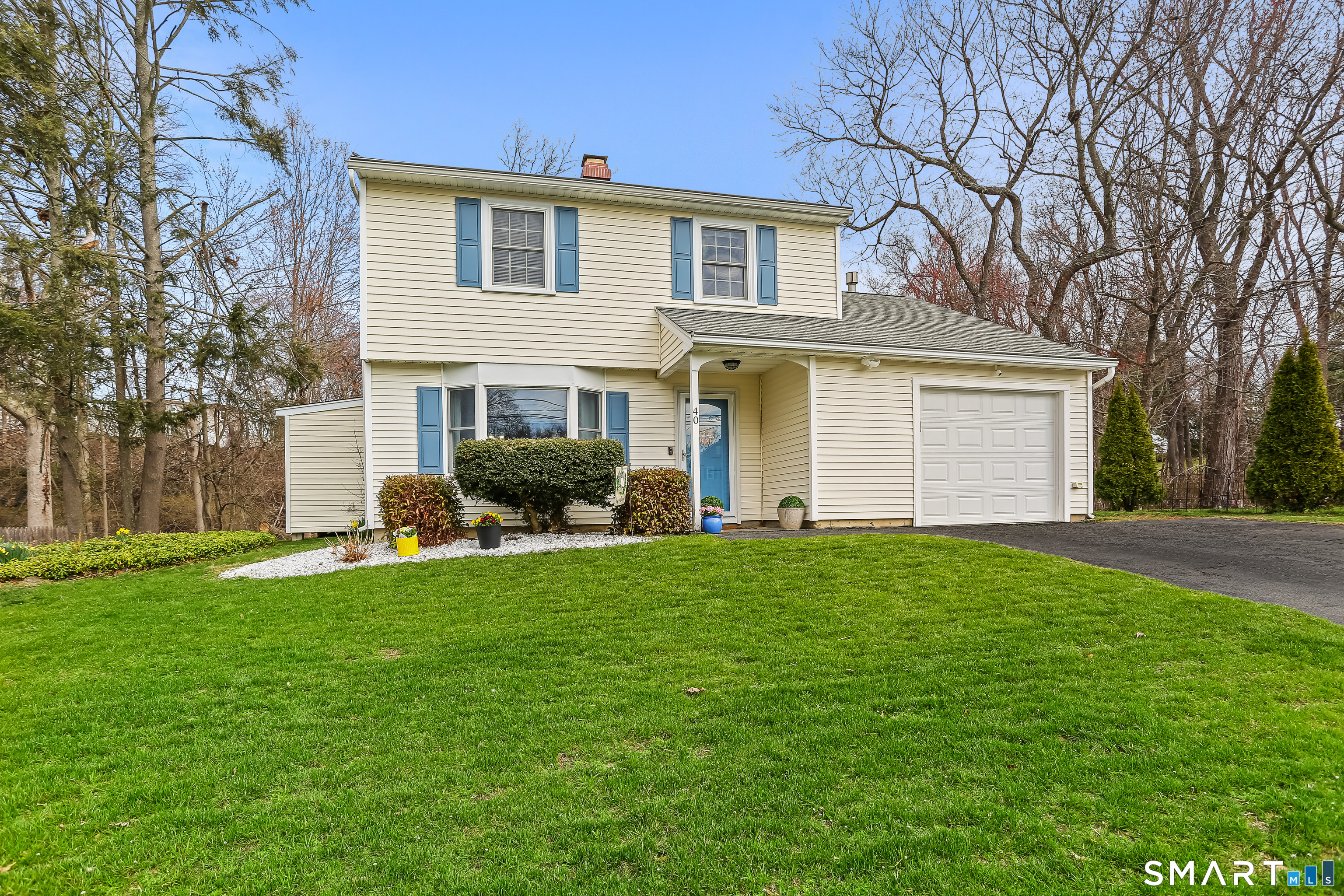 40 Sullivan Place Bridgeport, CT 06610 - Photo 2 of 21 a front view of house with yard and green space