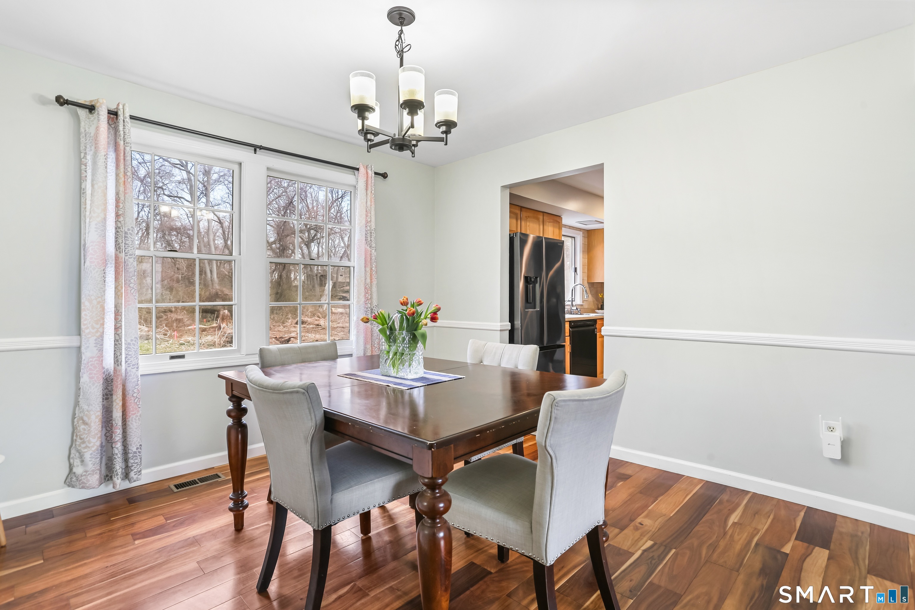 40 Sullivan Place Bridgeport, CT 06610 - Photo 9 of 21 a view of a dining room with furniture window and wooden floor