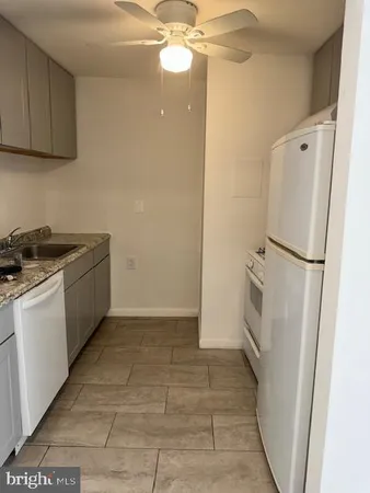 a kitchen with a stove and a microwave