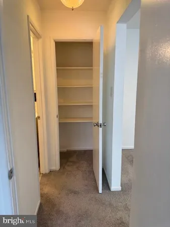 a bathroom with a toilet a sink and a shower