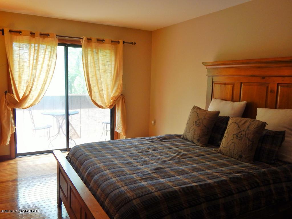 1105 Hampstead Road Bushkill, PA 18324 - Photo 13 of 35 a bedroom with a bed and a window
