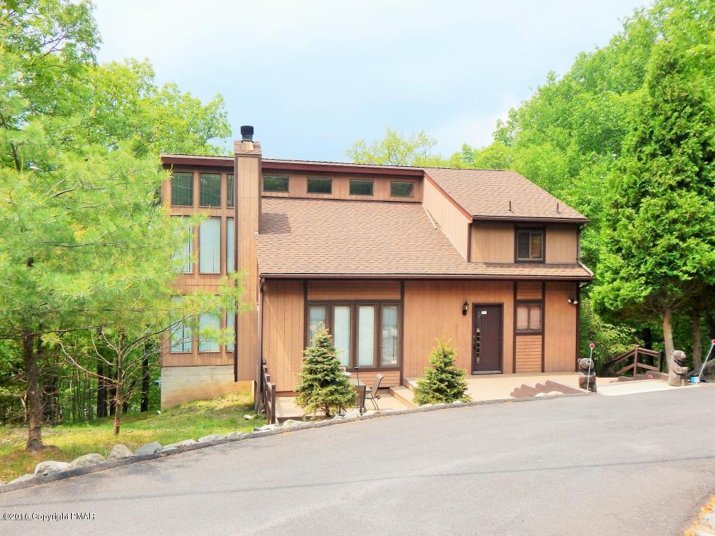 1105 Hampstead Road Bushkill, PA 18324 - Photo 7 of 35 a front view of a house with a garden