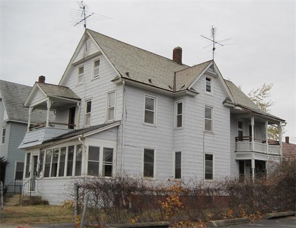 96-98 Cleveland Street Springfield, MA 01104 - Photo 1 of 1 a view of a white house with large windows