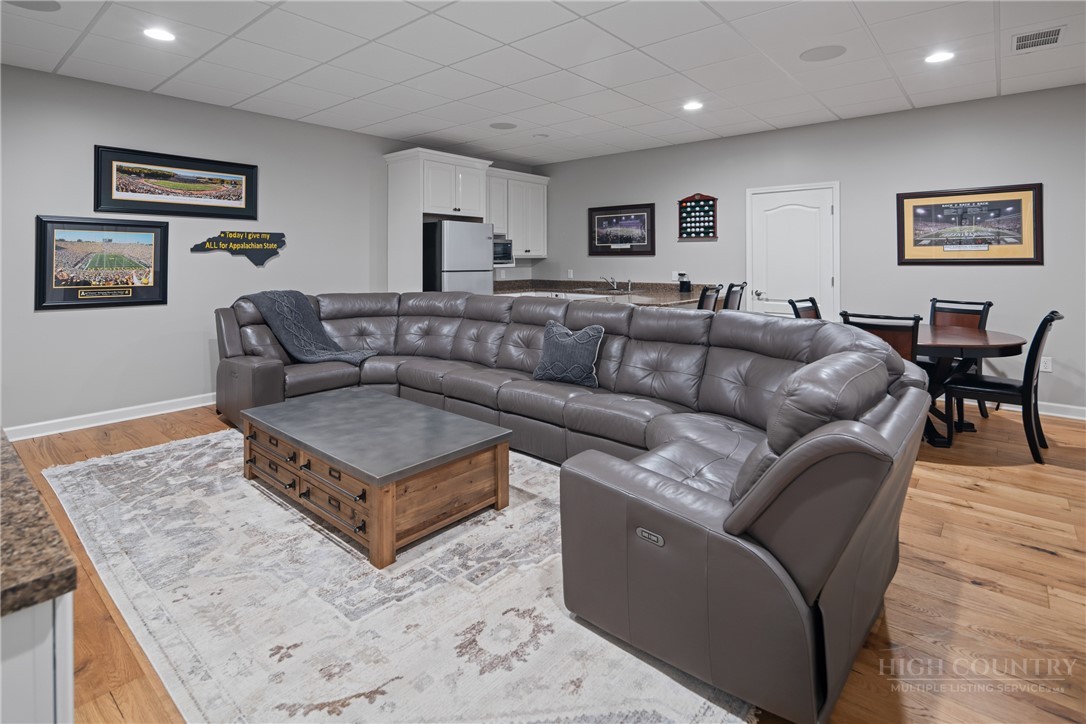 147 Riverside Park Court, Unit G2 Jefferson, NC 28640 - Photo 27 of 44 a living room with furniture