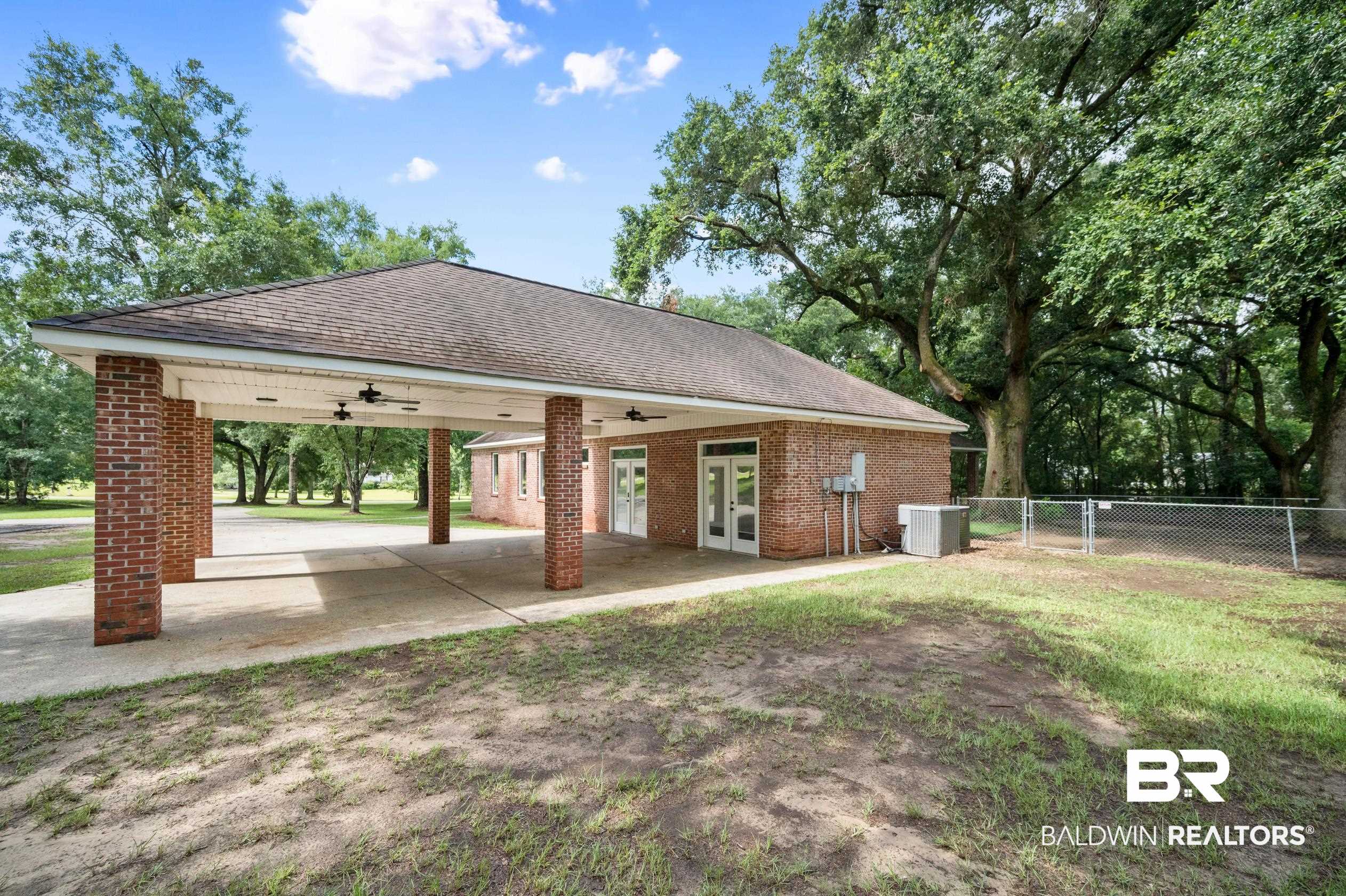 15031 Timber Ridge Drive Loxley, AL 36551 - Photo 41 of 43 Surrounding community with a patio