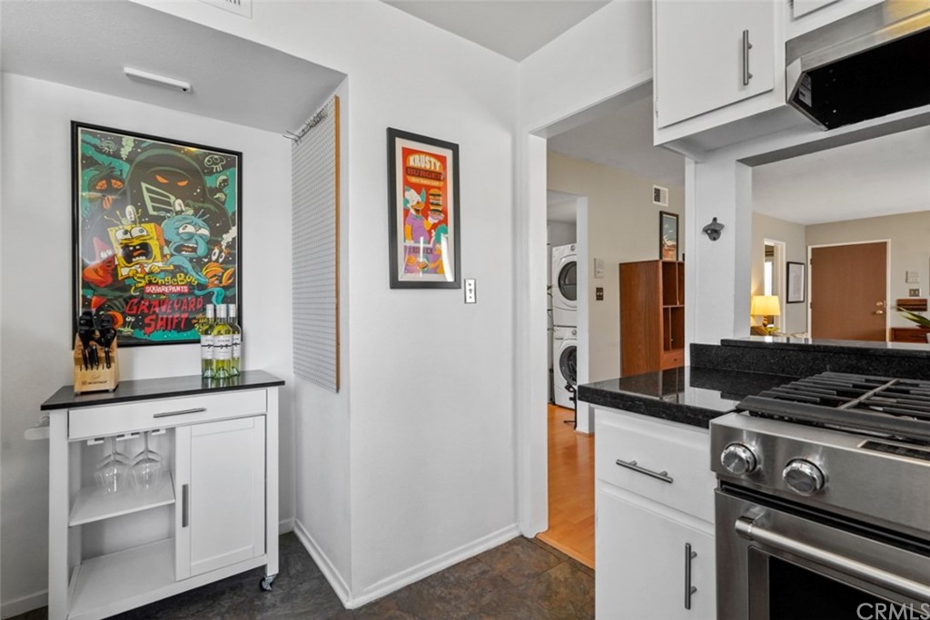 320 McHenry Road, Unit 20 Glendale, CA 91206 - Photo 11 of 27 a kitchen with stainless steel appliances cabinets and a window