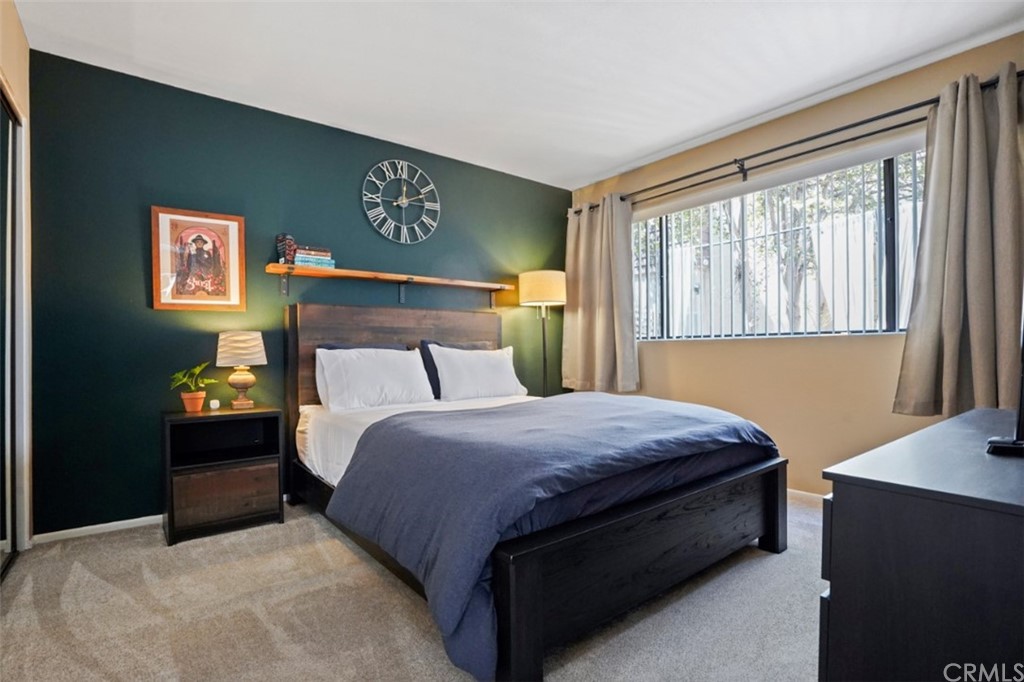 320 McHenry Road, Unit 20 Glendale, CA 91206 - Photo 12 of 27 a bedroom with a bed and window