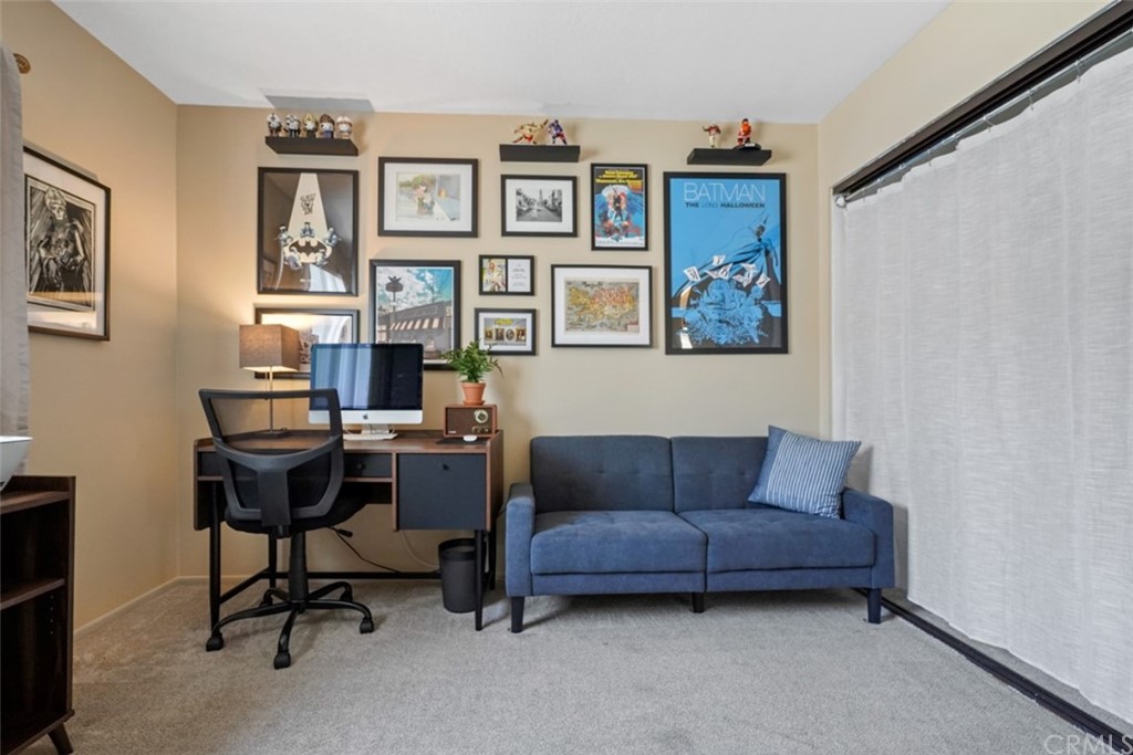 320 McHenry Road, Unit 20 Glendale, CA 91206 - Photo 16 of 27 a view of a livingroom with workspace and a couch