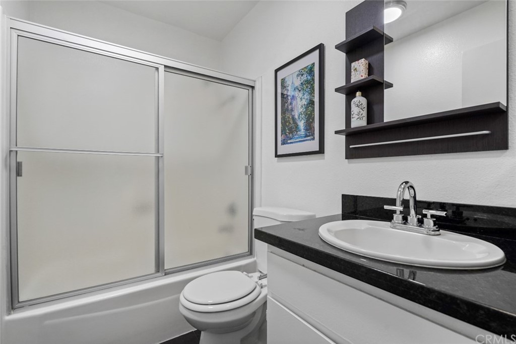 320 McHenry Road, Unit 20 Glendale, CA 91206 - Photo 19 of 27 a bathroom with a sink toilet and shower