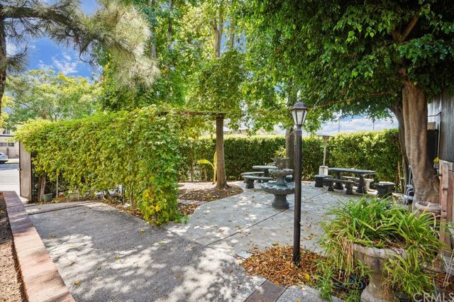 a view of a park with benches
