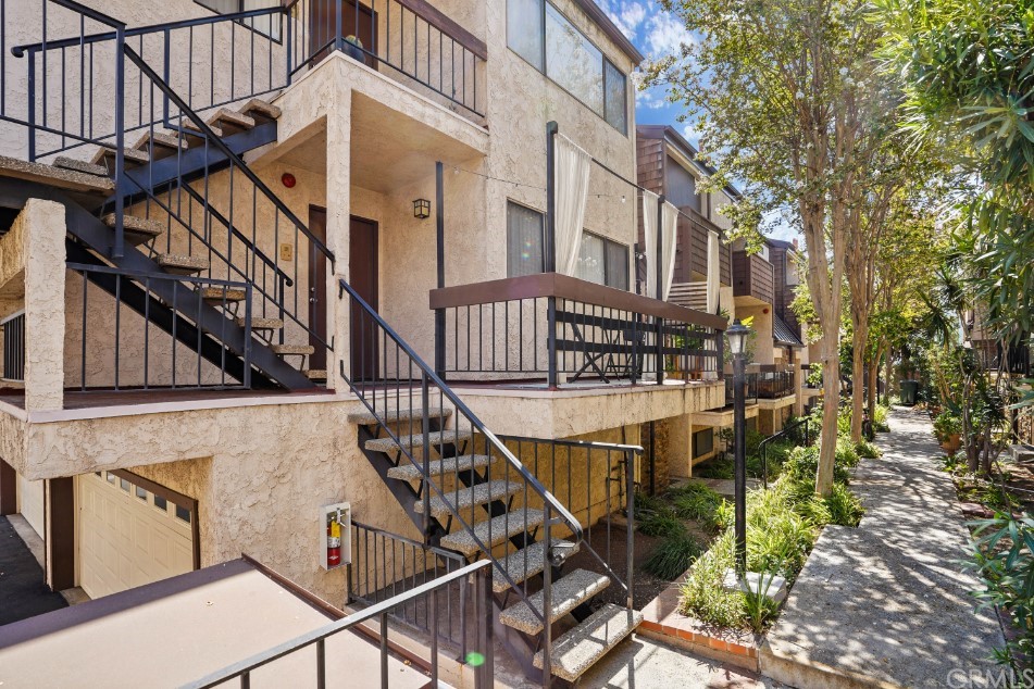320 McHenry Road, Unit 20 Glendale, CA 91206 - Photo 26 of 27 a view of a building with many windows