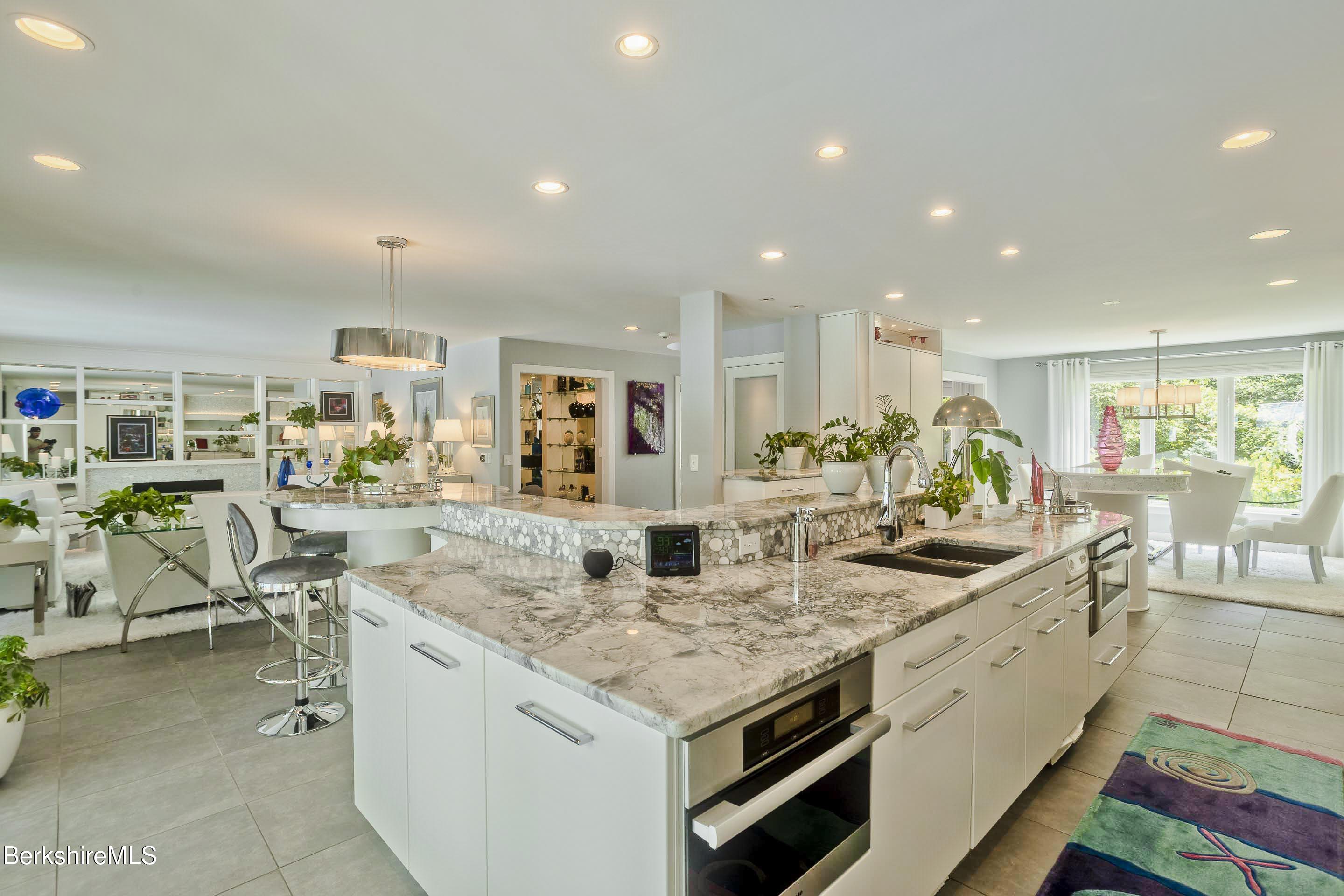 183 Loomis Ridge Road Westfield, MA 01085 - Photo 10 of 39 a view of a kitchen with kitchen island stainless steel appliances a sink and counter top space