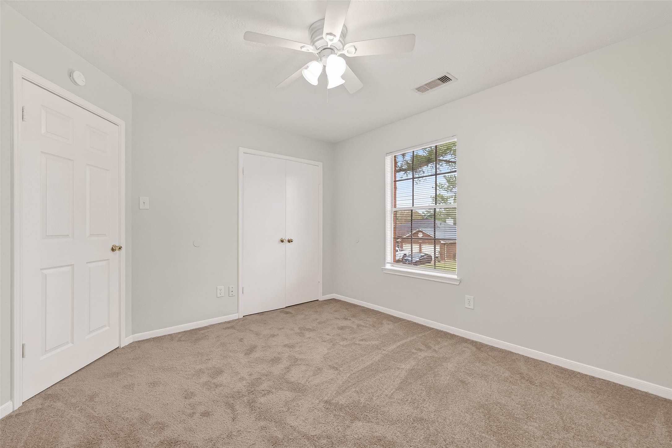 5439 Baslow Drive Katy, TX 77449 - Photo 18 of 31 a view of an empty room with a window