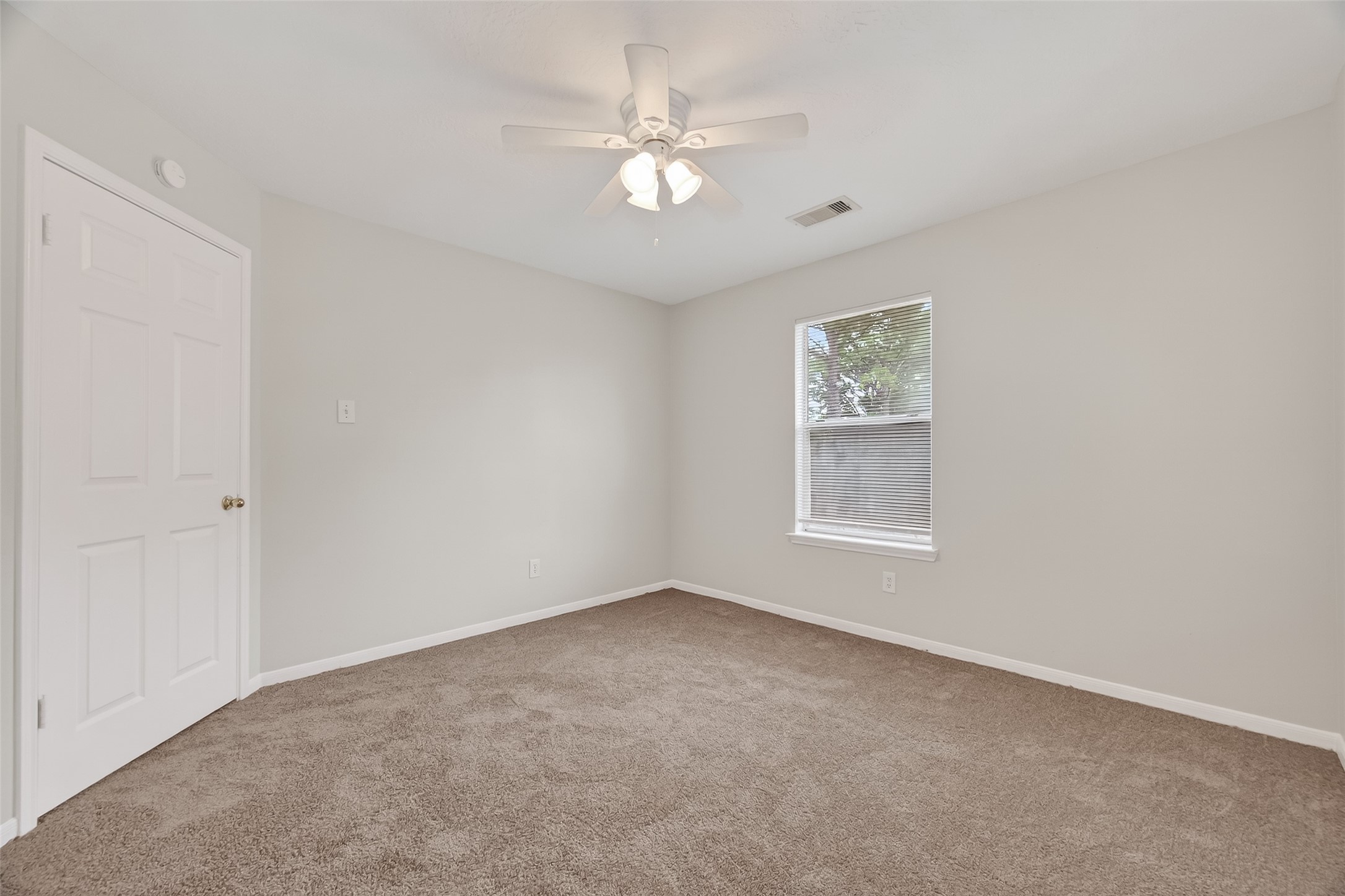 5439 Baslow Drive Katy, TX 77449 - Photo 20 of 31 a view of an empty room with a window