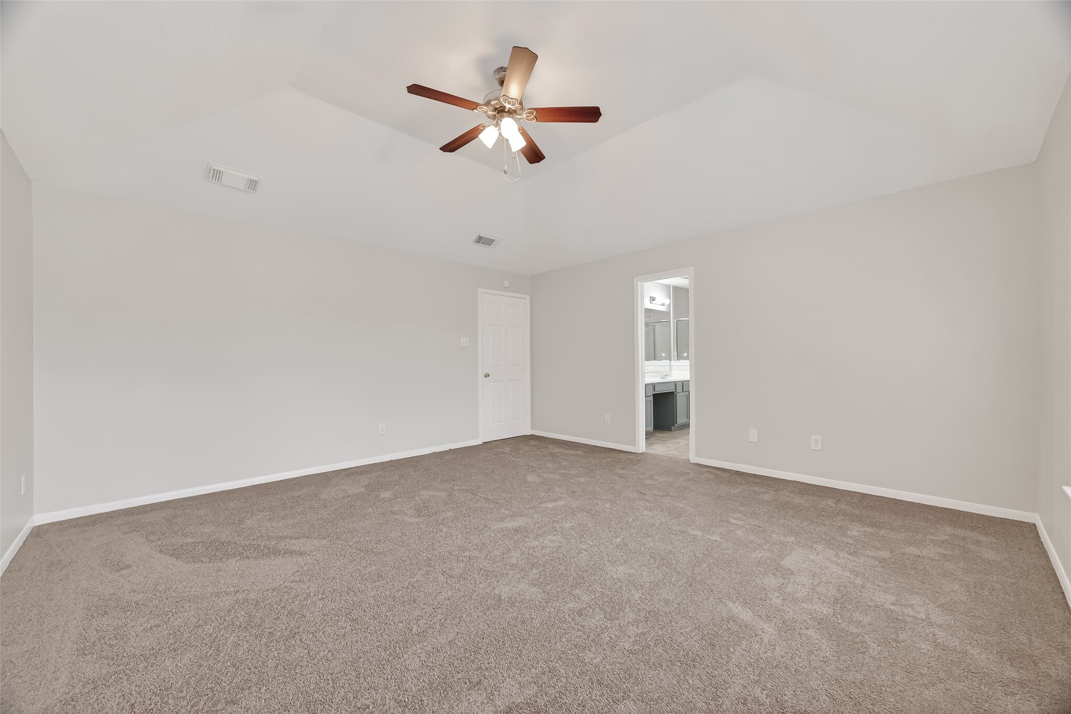 5439 Baslow Drive Katy, TX 77449 - Photo 27 of 31 an empty room with ceiling fan and window