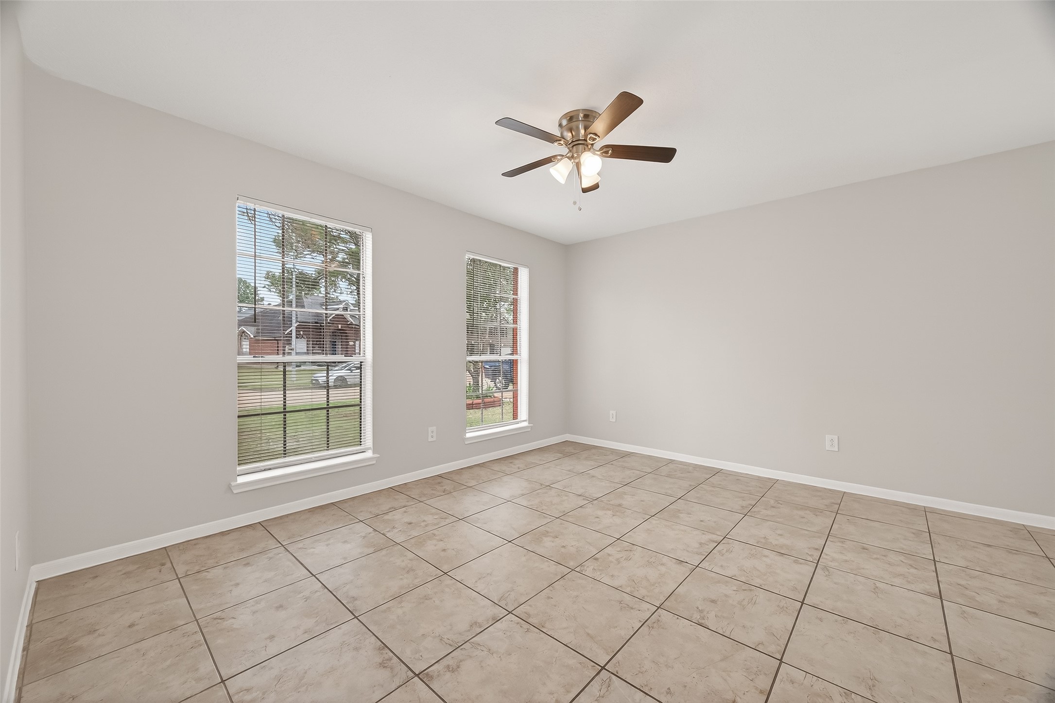 5439 Baslow Drive Katy, TX 77449 - Photo 7 of 31 a view of an empty room with a window