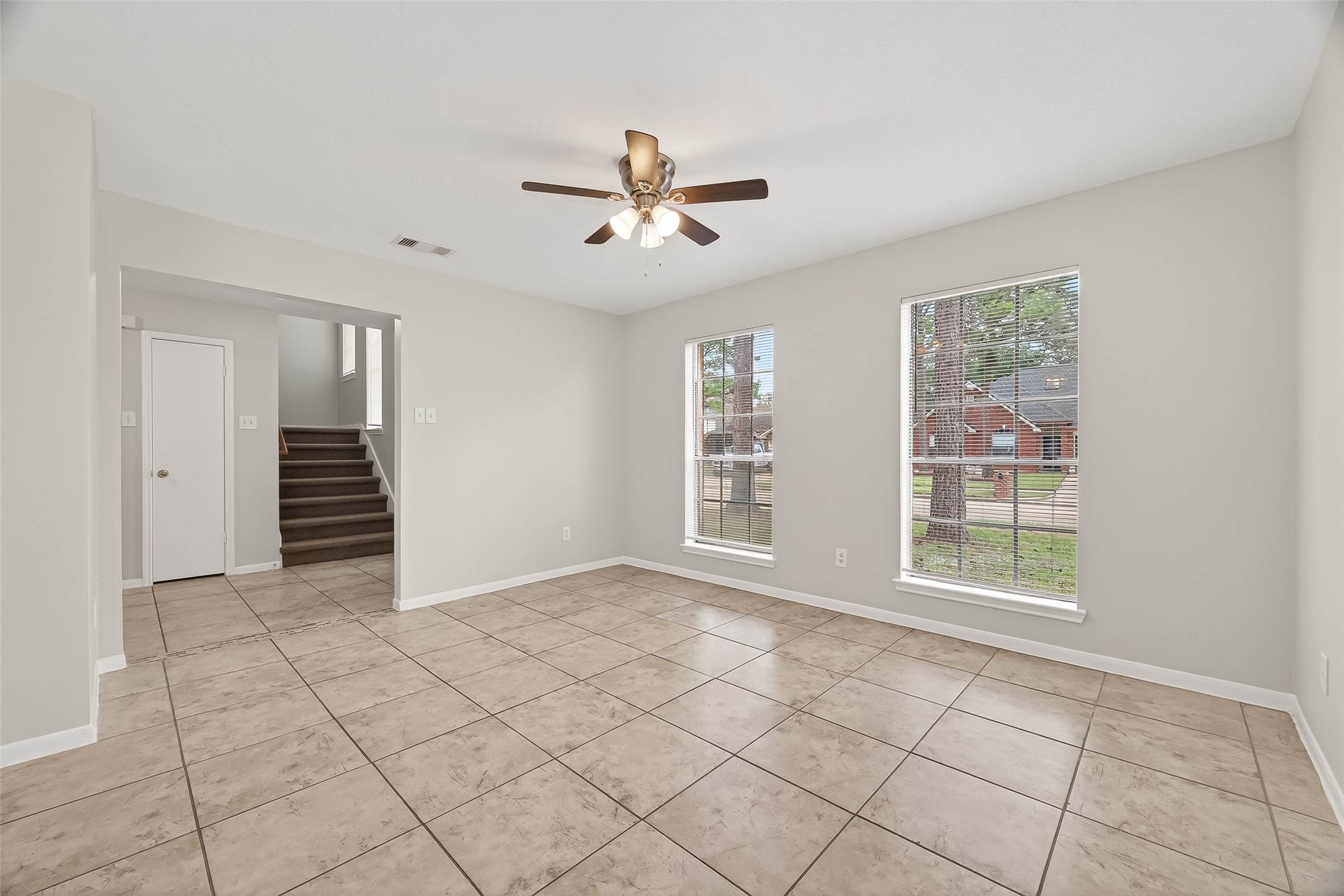 5439 Baslow Drive Katy, TX 77449 - Photo 8 of 31 a view of an empty room with a window
