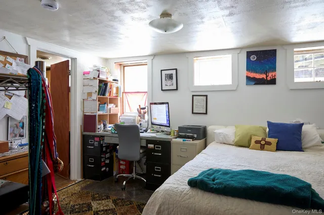 a bathroom with a sink toilet and mirror