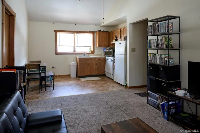 a view of room with workspace and window