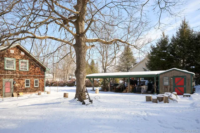 a view of a house with a tree