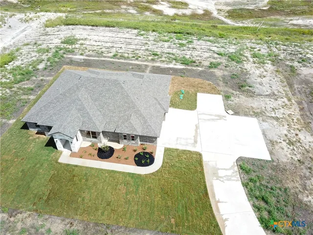 a view of a house with a ocean view