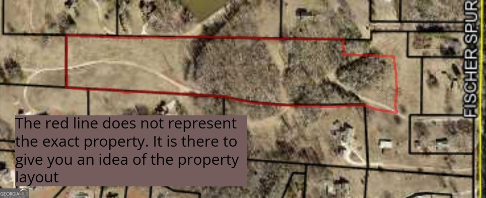 0 Fischer Spur Newnan, GA 30265 - Photo 5 of 5 a sign on the side of a building