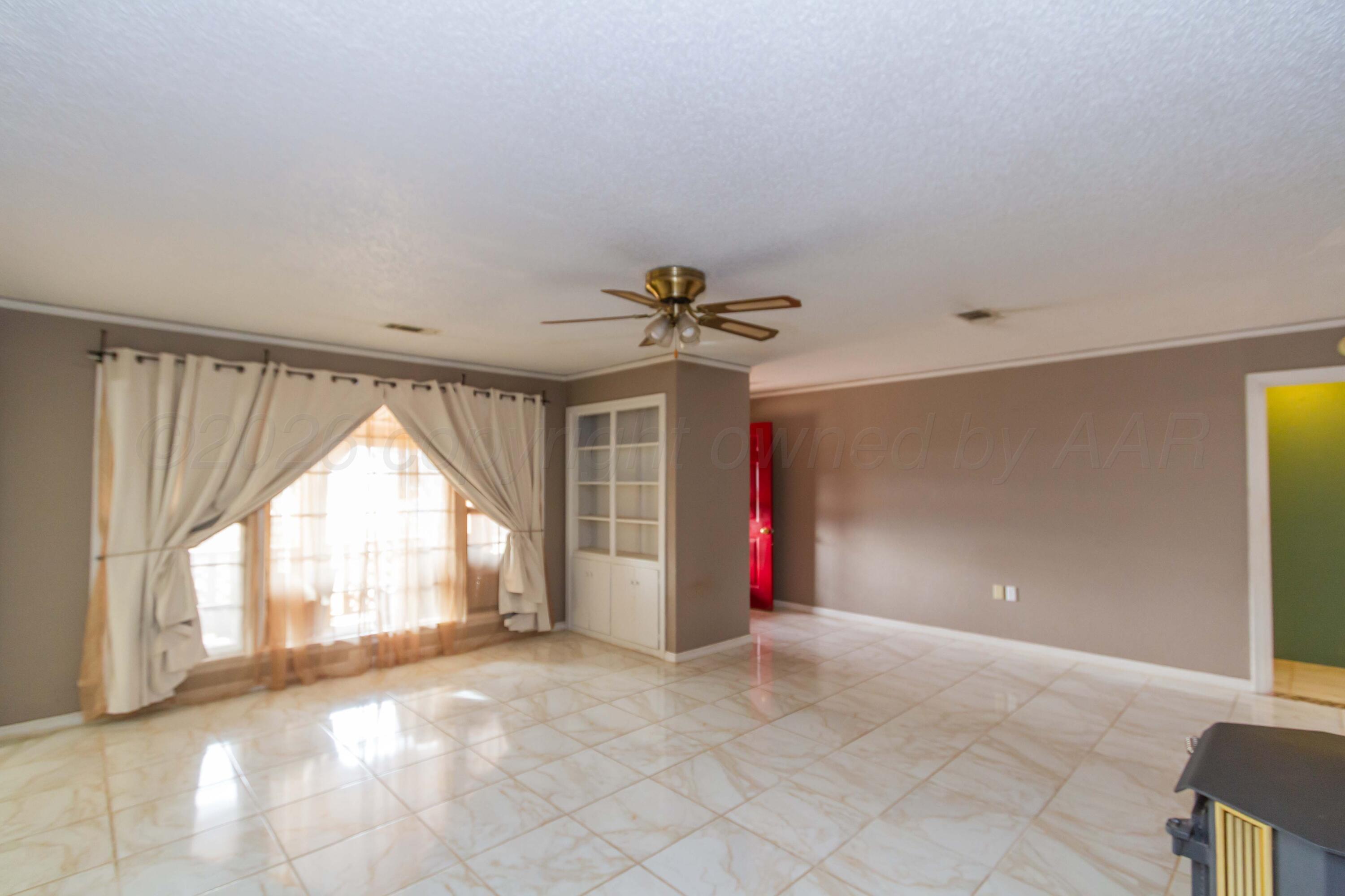 7850 Back Acres Road Amarillo, TX 79119 - Photo 4 of 52 LIVING ROOM VIEW 1