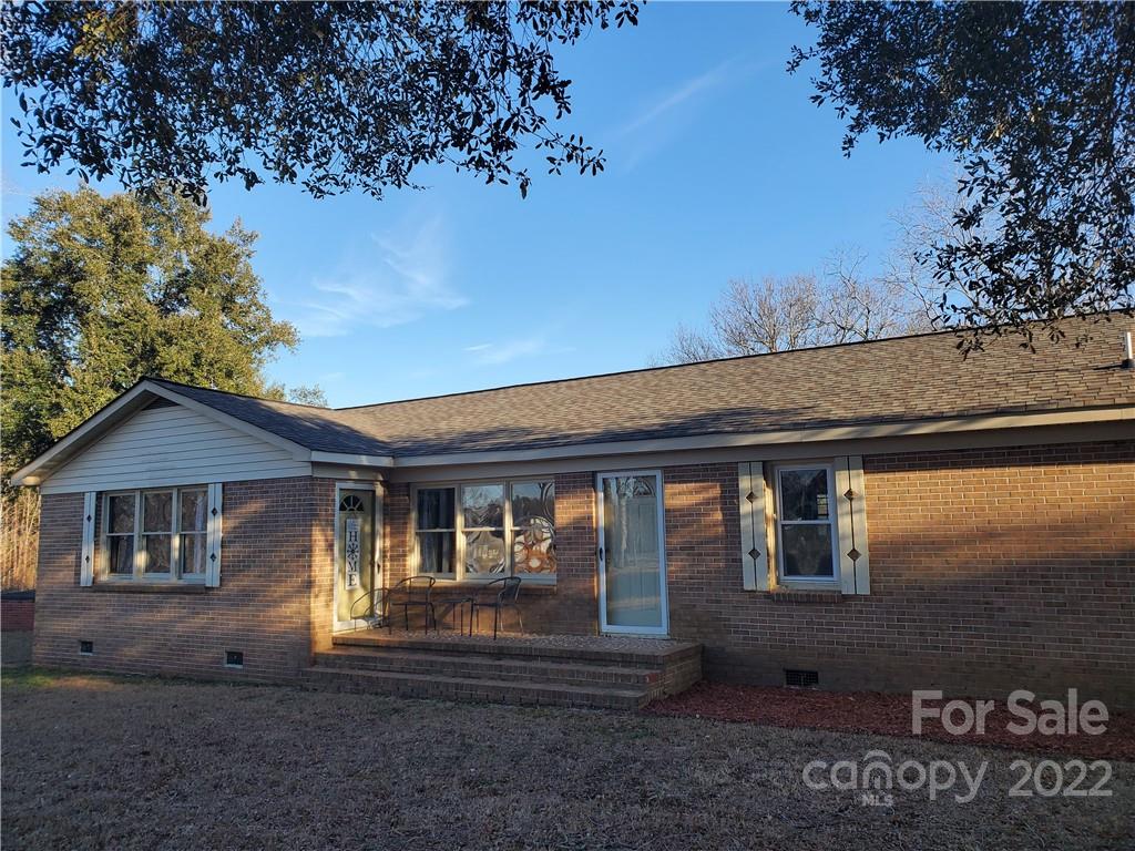 204 Davis Rivers Road Chesterfield, SC 29709 - Photo 1 of 42 a front view of a house with garden