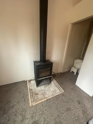 a living room with a rug