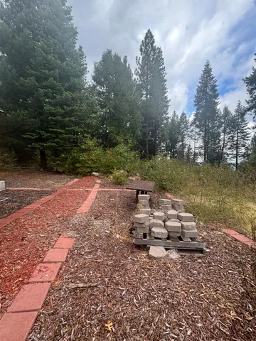a view of a lake with trees