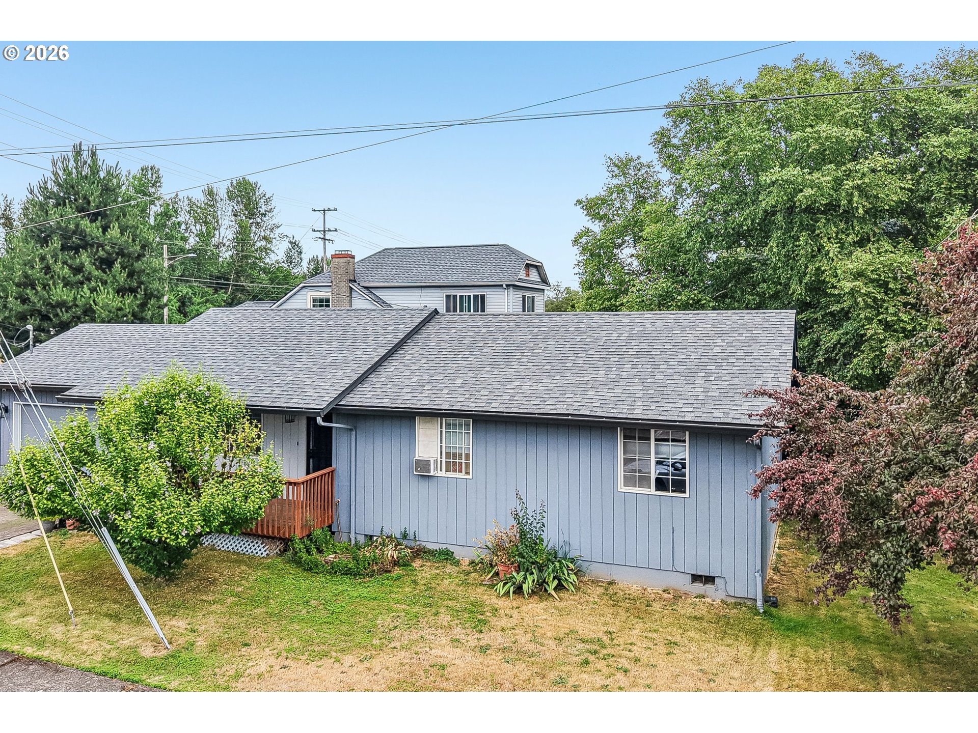 608 Southeast Sumner Street Camas, WA 98607 - Photo 30 of 39 a backyard of a house with lots of green space
