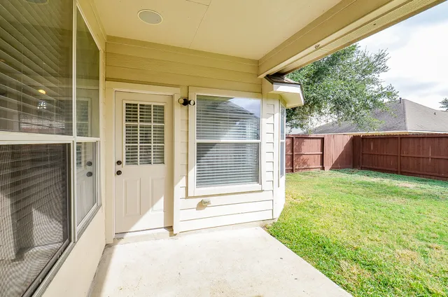 a backyard of a house with garden