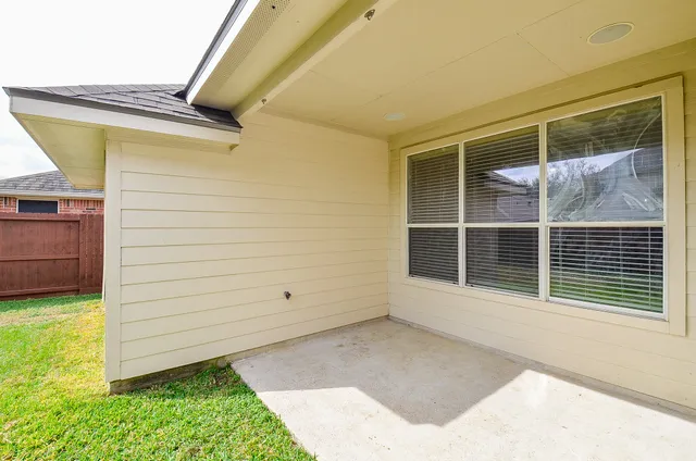 a view of a backyard with a garden