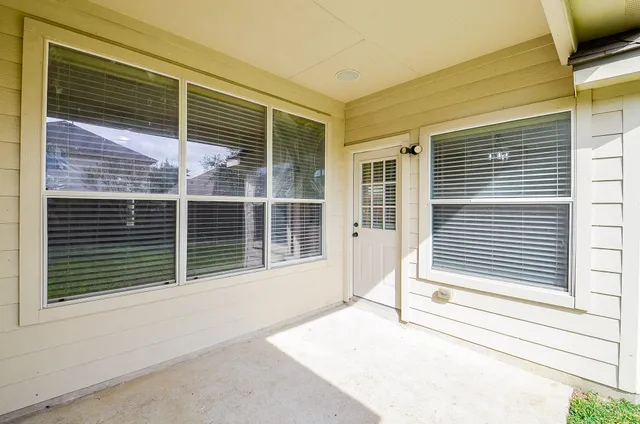 a view of a house with a large window
