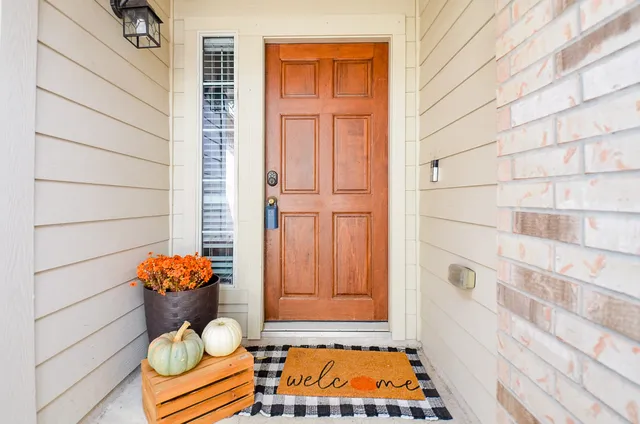 a bathroom with a toilet and shower