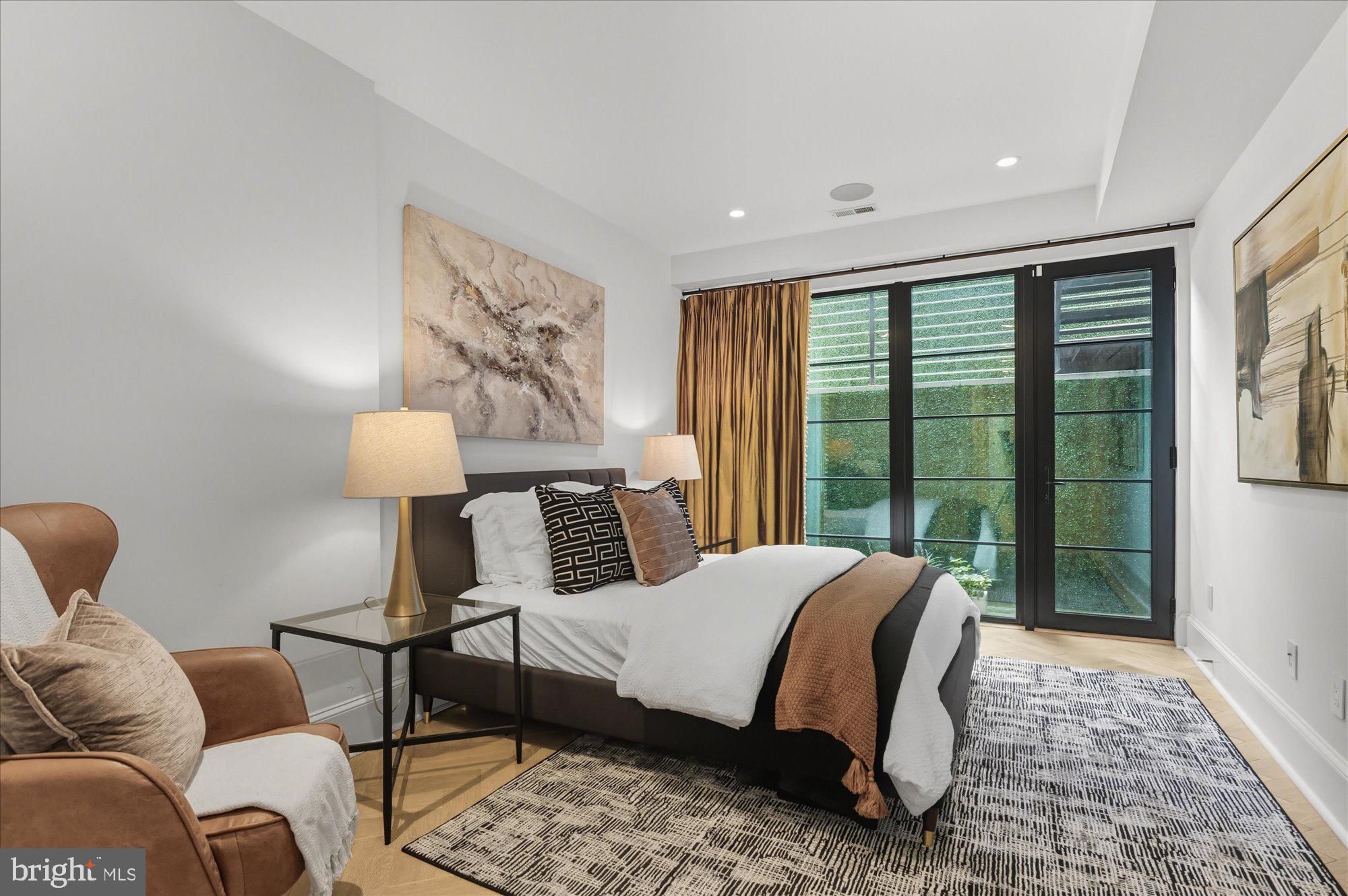 1309 R Street Northwest, Unit 1 Washington, DC 20009 - Photo 25 of 56 Bright Primary Bedroom Suite