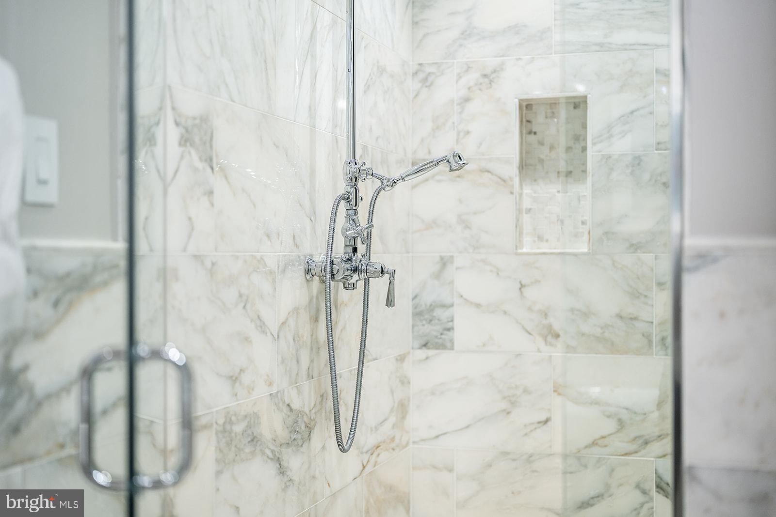 1309 R Street Northwest, Unit 1 Washington, DC 20009 - Photo 30 of 56 Marble shower with high end taps