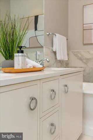 a bathroom with a toilet sink and shower