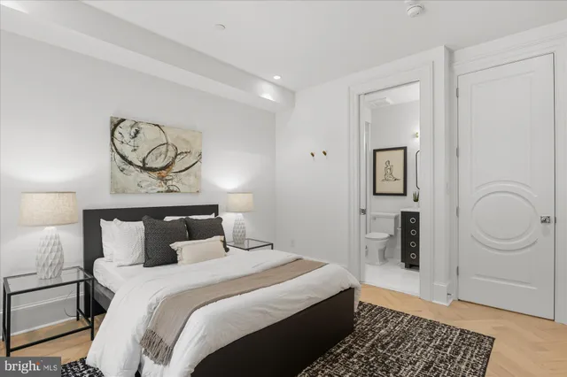 a dining room with furniture and a window