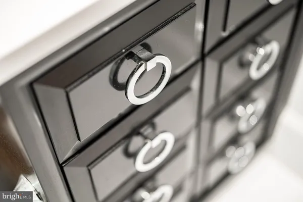 a workspace room with furniture and a window