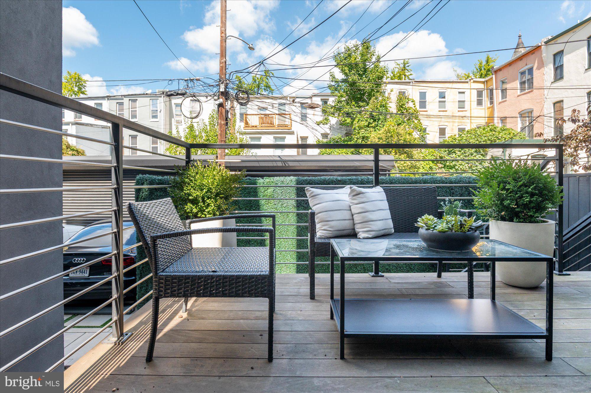 1309 R Street Northwest, Unit 1 Washington, DC 20009 - Photo 49 of 56 Outdoor deck off of the living room