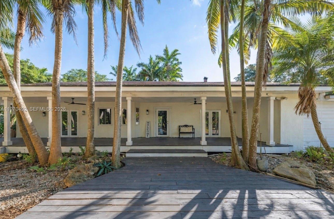 20076 Southwest 190th Street Miami, FL 33187 - Photo 1 of 32 a view of a house with a backyard