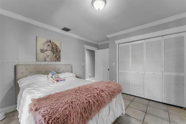 a bathroom with a sink a mirror and a shower