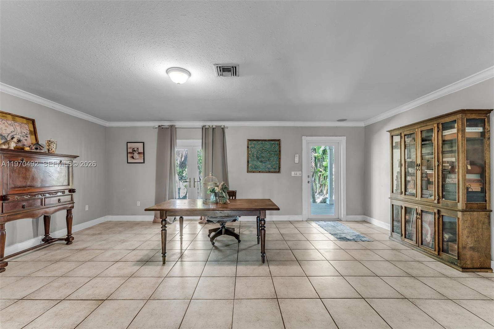 20076 Southwest 190th Street Miami, FL 33187 - Photo 7 of 32 a view of a livingroom with furniture window and wooden floor
