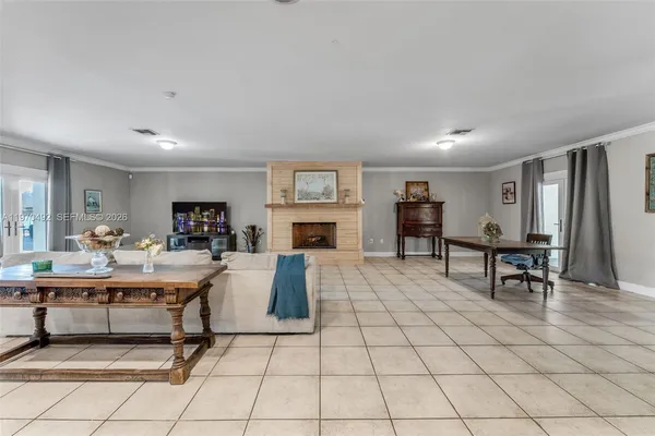 a living room with furniture and a table